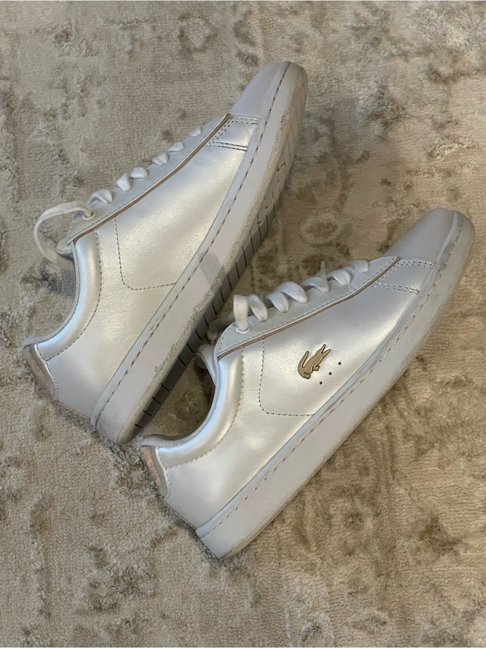 white leather Lacoste sneakers